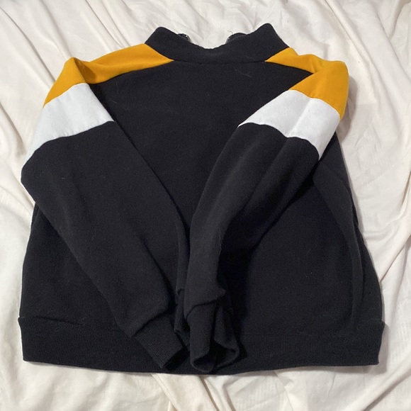 Black sweater with yellow and white sleeves - Picture 2 of 3